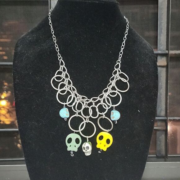 Repurposed Fiesta of Skulls metal hoop statement necklace with clasp enclosure - Picture 3 of 5